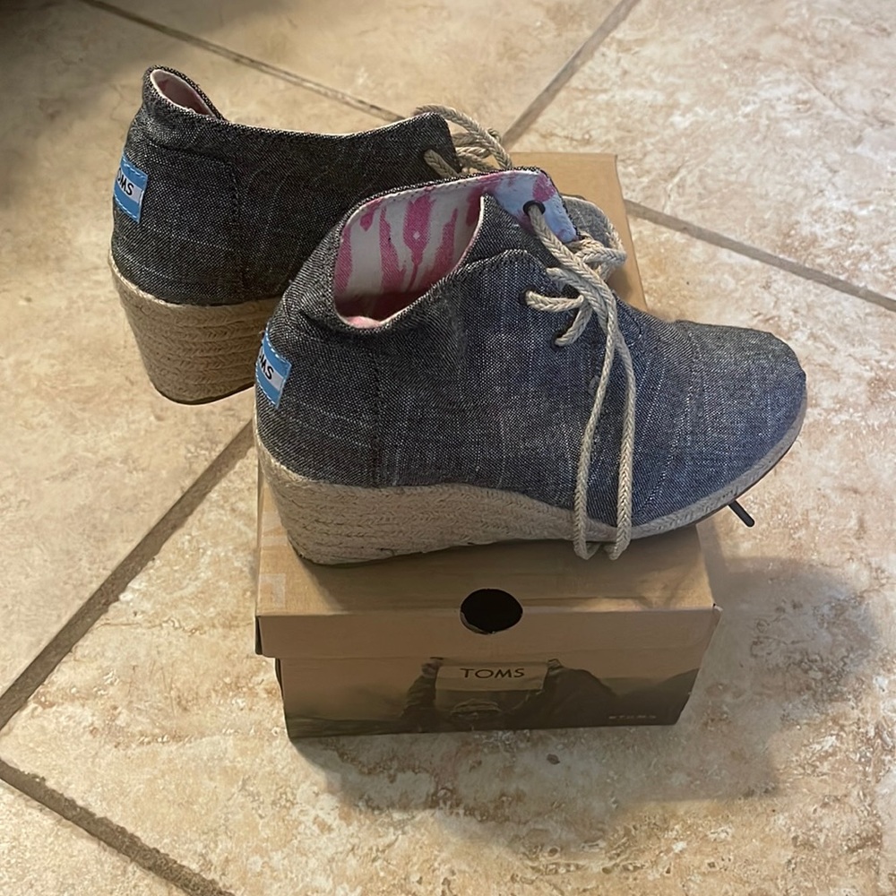 Cleaning out my closet! Great condition items. Women TOMS denim wedge size 7